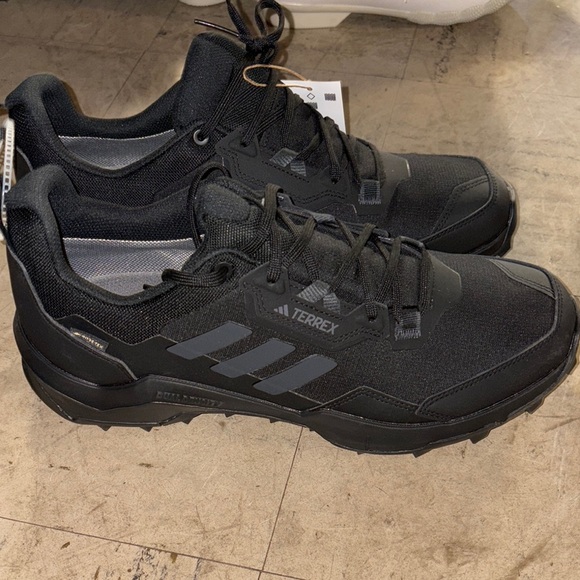 Adidas Black Athletic Shoes with Rugged Sole and Mid-Cut Design - Picture 1 of 2